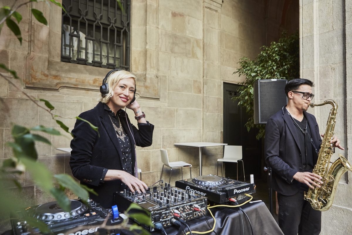 DJ and sax player performing at a corporate event in Barcelona